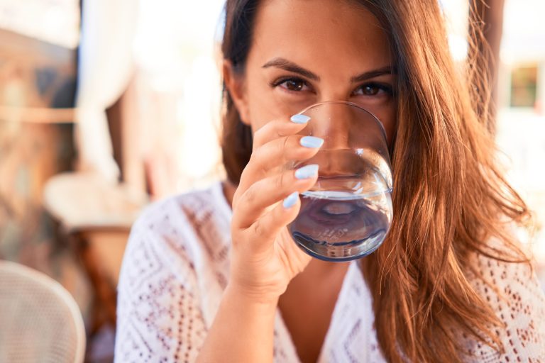 woman drinking well water