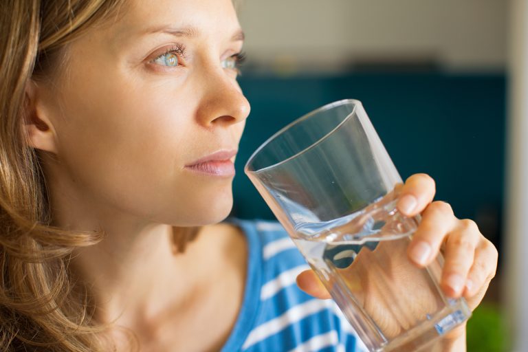 woman drinking clean water